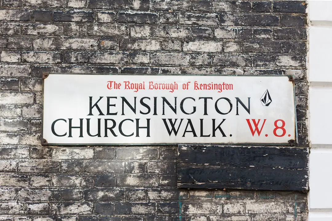 white signage mounted on wall